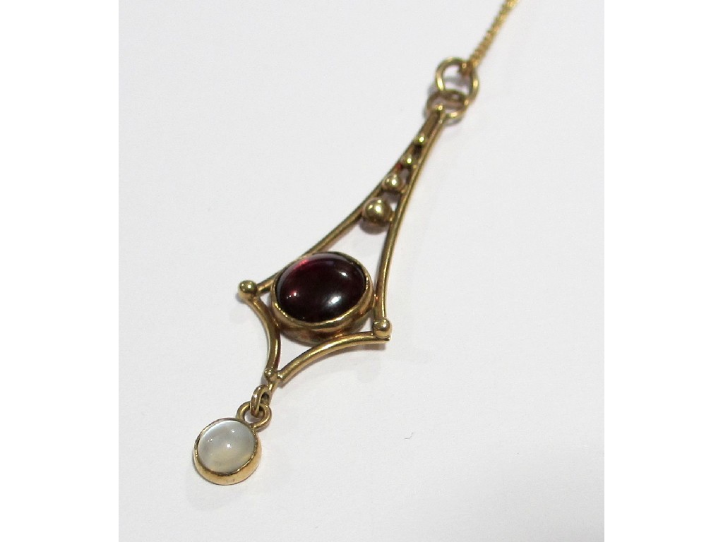 Appraisal: A gold cabochon garnet and moonstone set pendant on ct