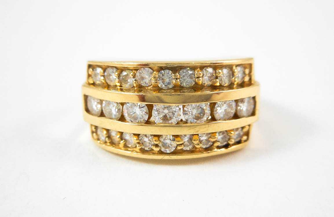 Appraisal: MOISSANITE AND FOURTEEN KARAT GOLD RING with two rows of