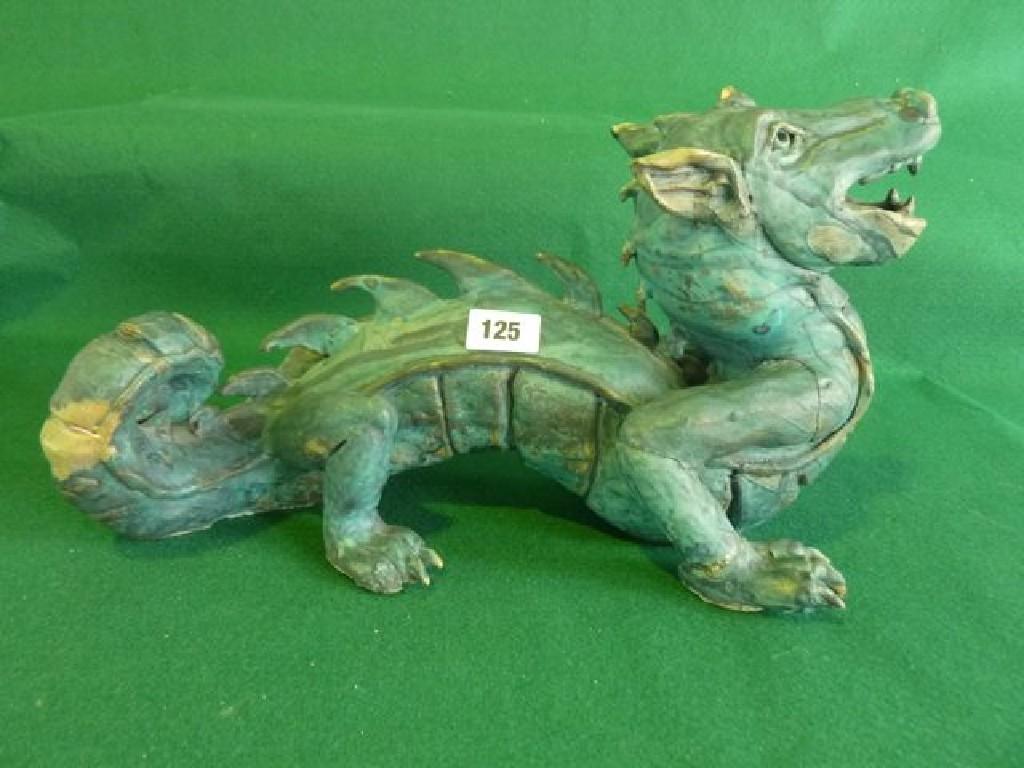 Appraisal: A large Studio Pottery model of a dragon approx cm