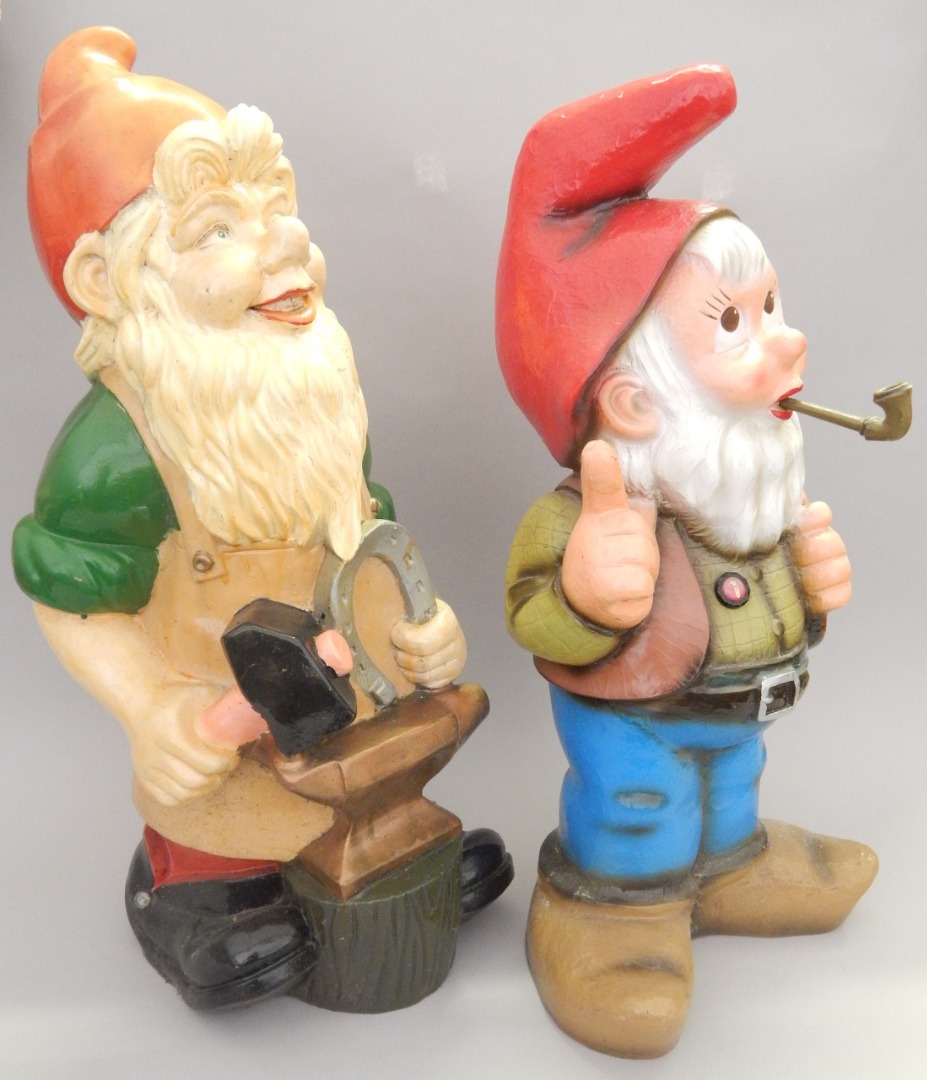 Appraisal: Two garden gnomes each with original paint one smoking a