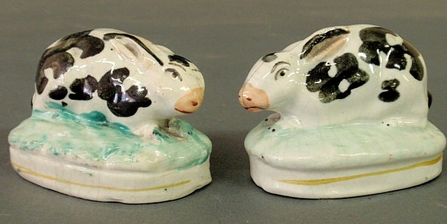 Appraisal: Two similar Staffordshire rabbits mid th c h x l