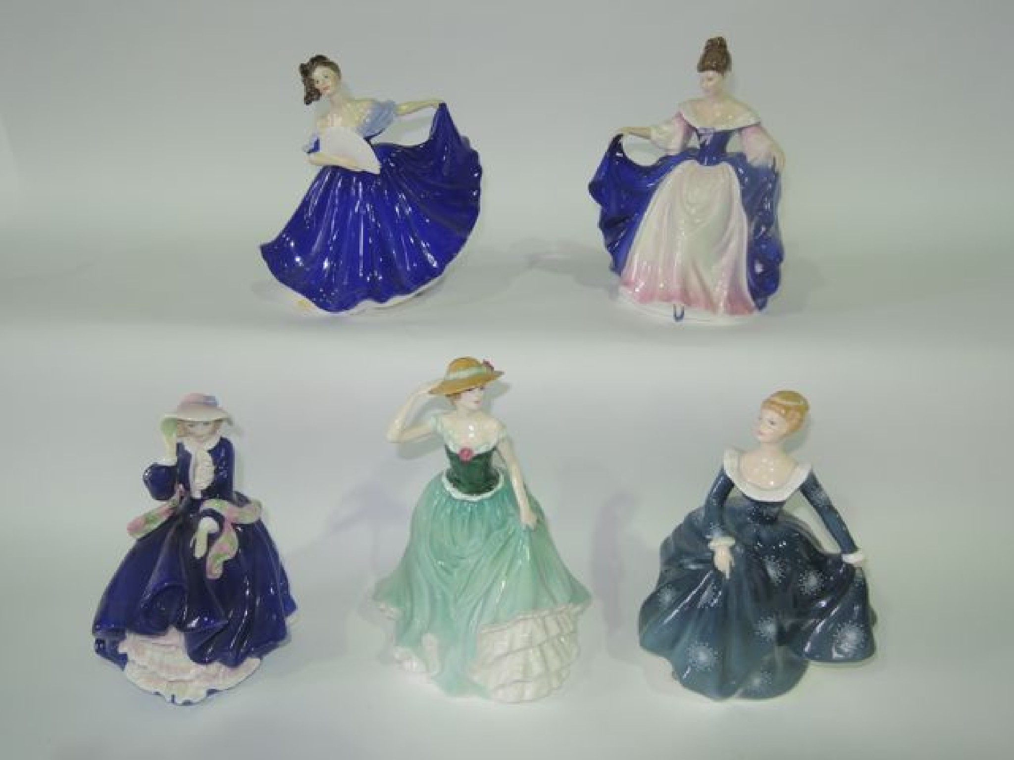 Appraisal: A collection of five Royal Doulton figures comprising Elaine HN