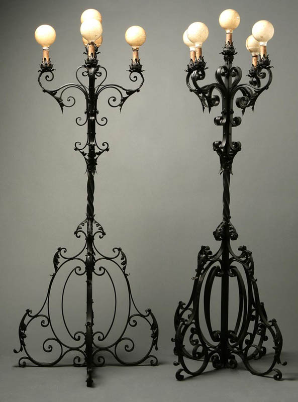 Appraisal: Pair monumental Baroque style iron torcheres Pair monumental Baroque style