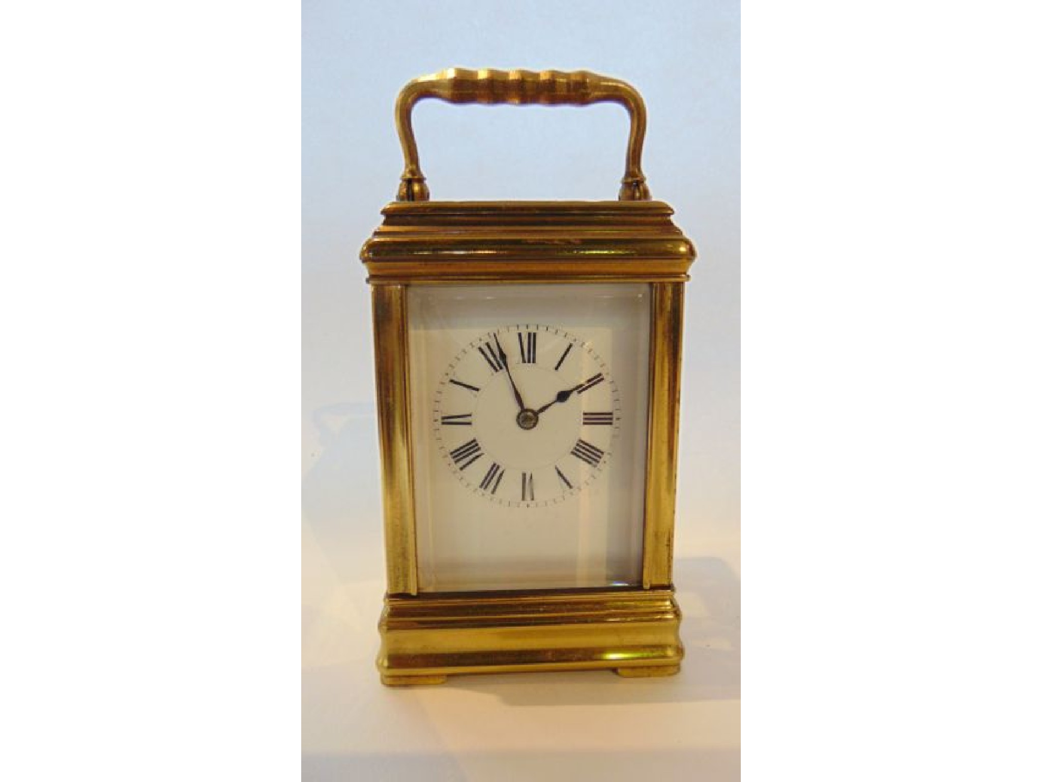 Appraisal: A small brass carriage clock set in a simple gorge