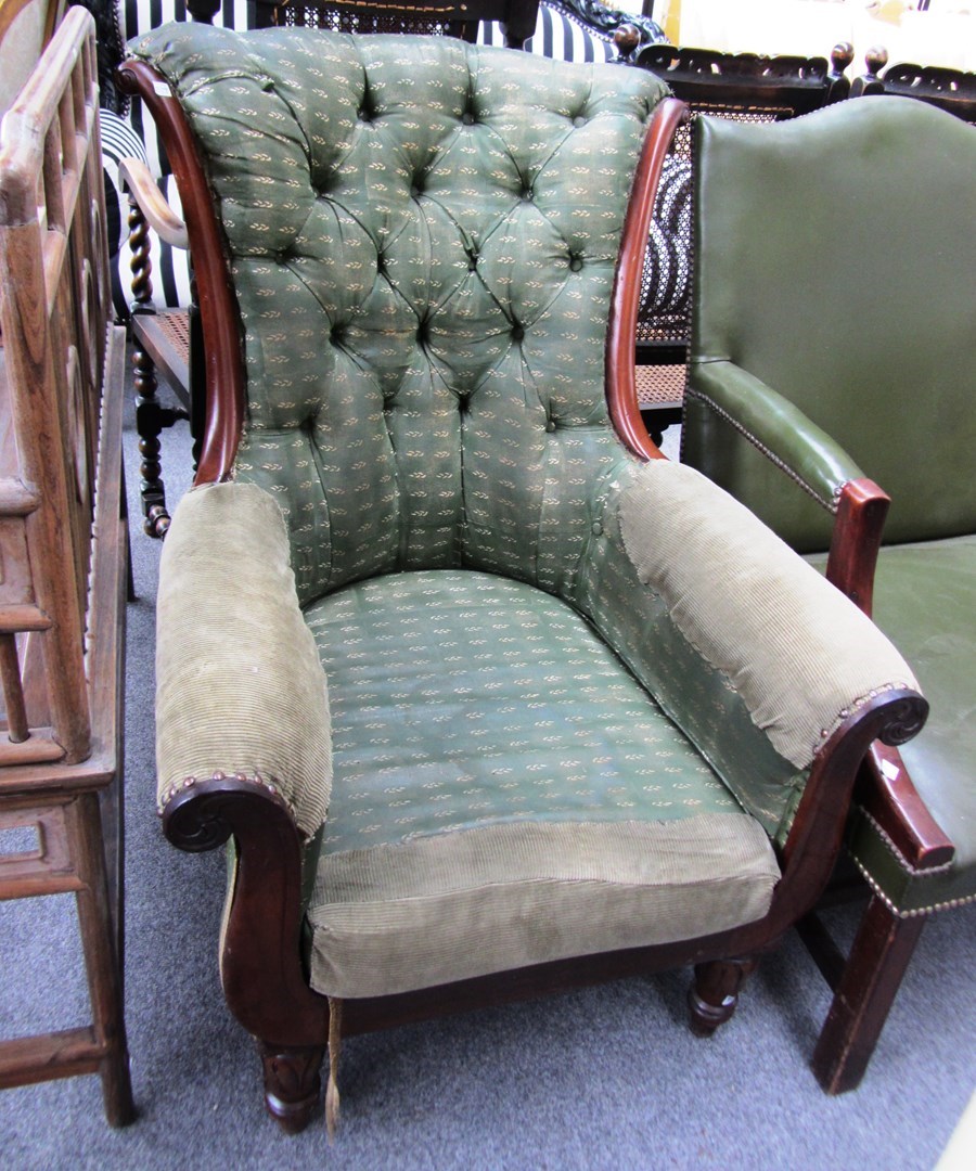 Appraisal: A William IV mahogany framed button back armchair on lappet