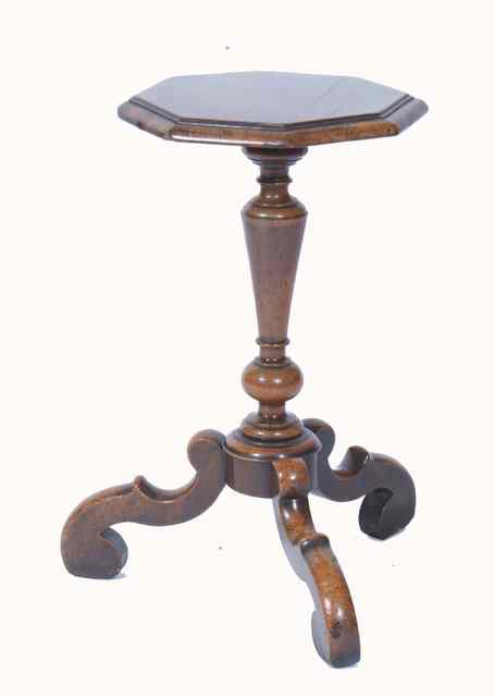 Appraisal: A COROLEAN STYLE WALNUT CANDLE STAND with octagonal top turned