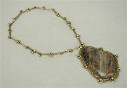 Appraisal: Brass Link Necklace with a Stone Pendant