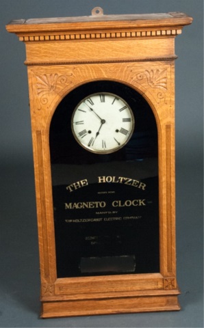 Appraisal: Holtzer Magneto Clock Oak Case Battery Operated H x W