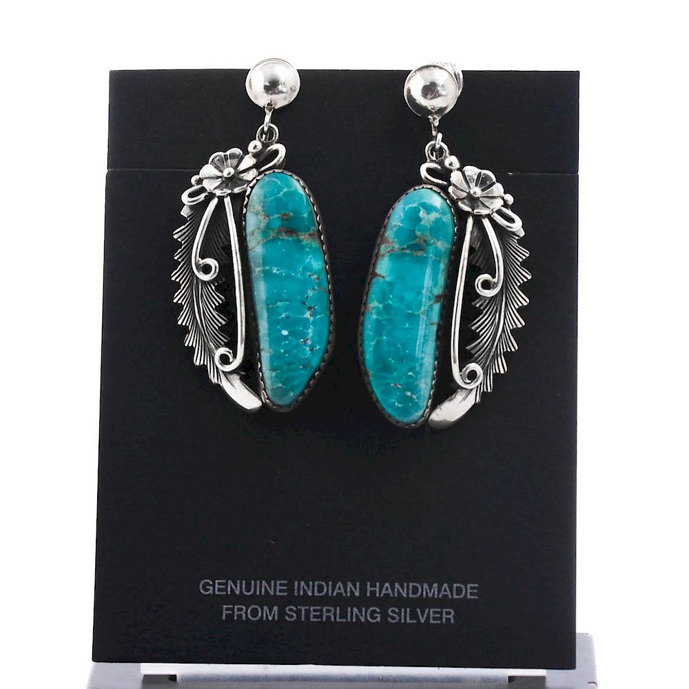 Appraisal: NATIVE AMERICAN SILVER AND TURQUOISE RINGS AND EARRINGS Hallmarked silver