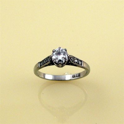 Appraisal: A diamond solitaire ring the circular cut diamond weighs approximately