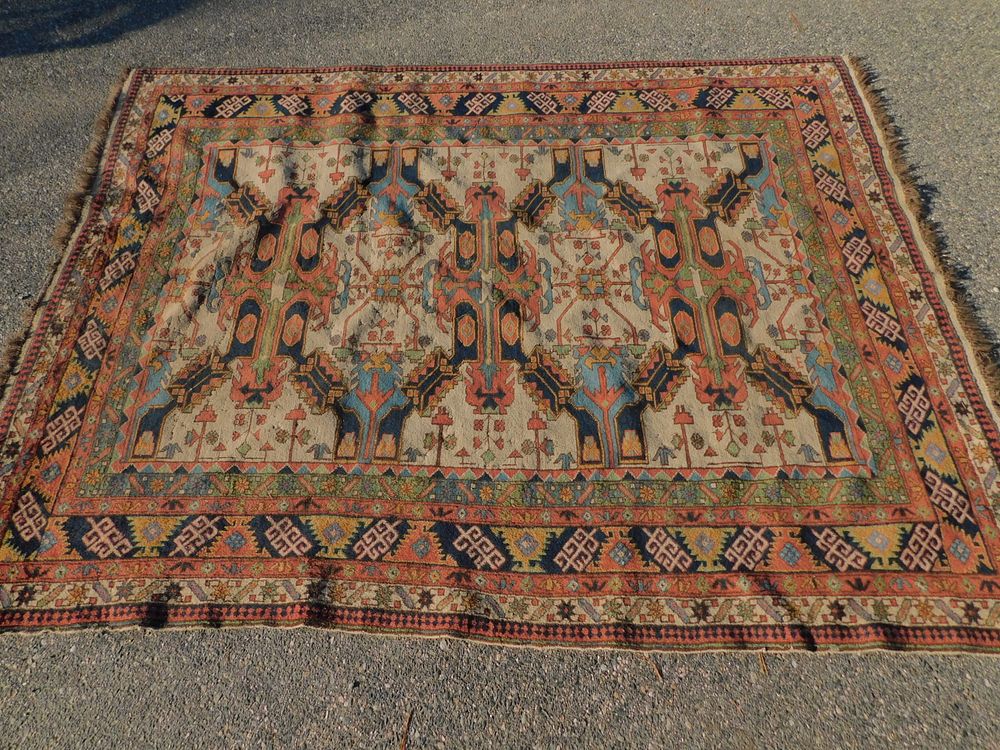 Appraisal: ANTIQUE CAUCASIAN RUG Semi-antique Caucasian scatter rug with pastel colors