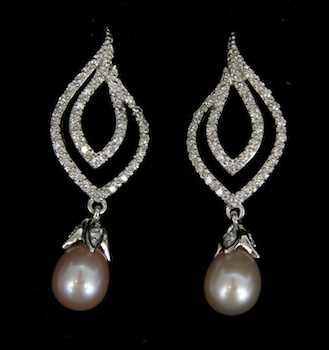 Appraisal: A Pair of Chic Diamond Earrings Set with Pearls k