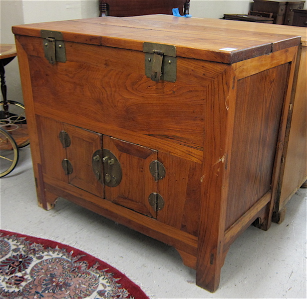 Appraisal: CHINESE YUMU WOOD STORAGE CABINET having a double lift top