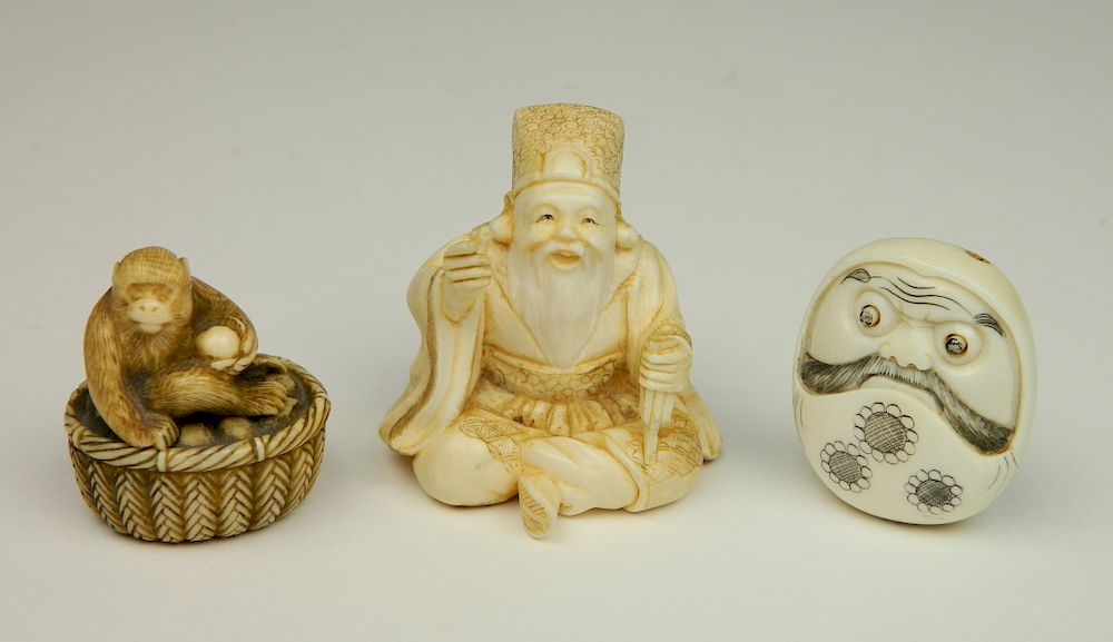 Appraisal: Carved ivory Netsuke Carved ivory Netsuke- including one of Daruma