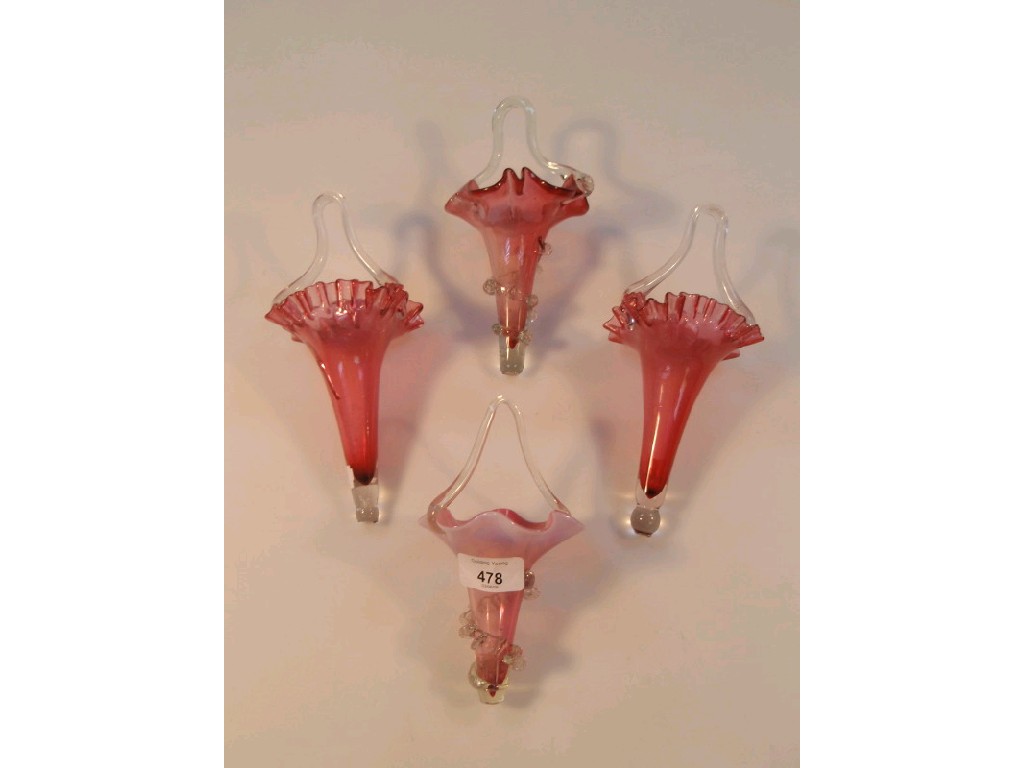 Appraisal: Three cranberry glass epergne vases and a pink vaseline example