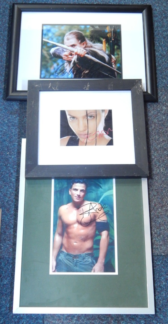 Appraisal: Three autographed photographs of Orlando Bloom Angelina Jolie and Peter