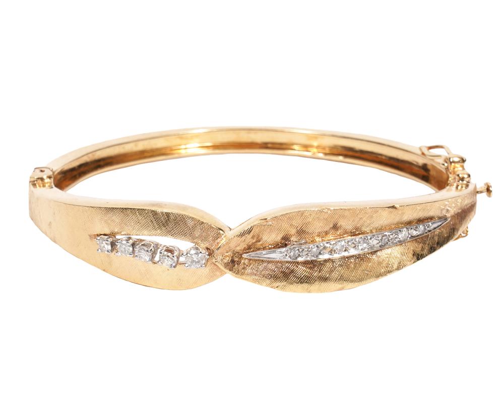 Appraisal: K YG DIAMOND HINGED BANGLE BRACELET K yellow gold and