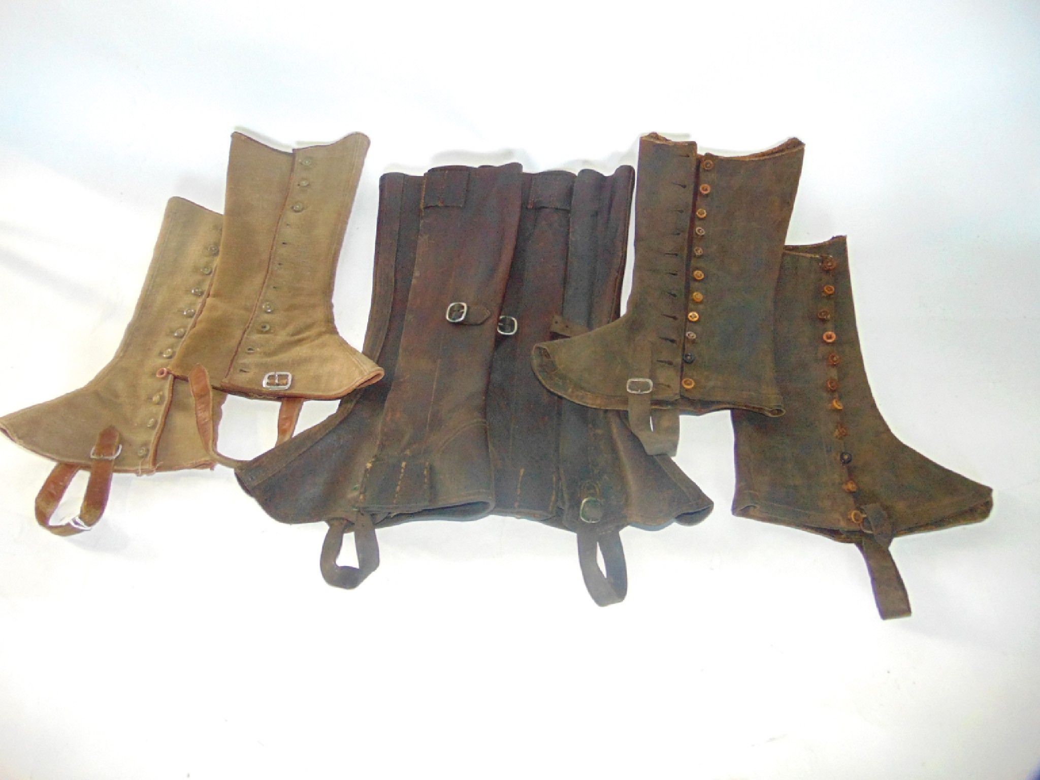 Appraisal: Two antique pairs of leather gaiters one fitted with buttons