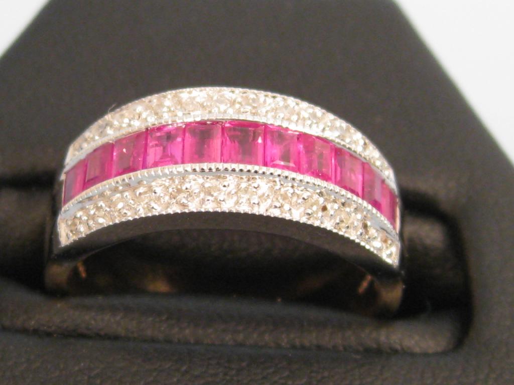 Appraisal: A Contemporary Ruby and Diamond Half-Hoop Eternity Ring the eleven