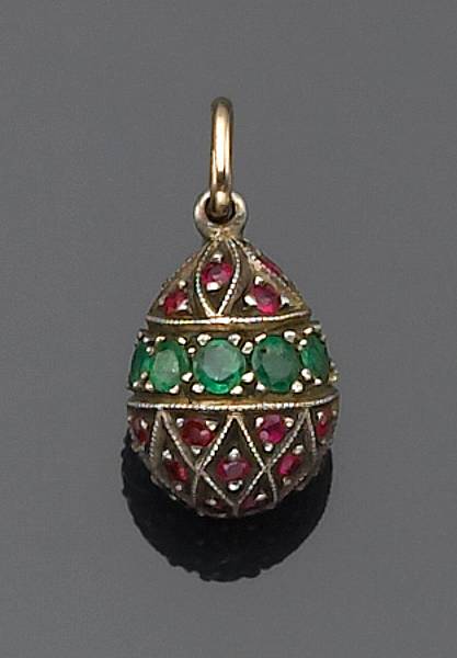 Appraisal: A ruby emerald and silver miniature egg pendant Russian designed