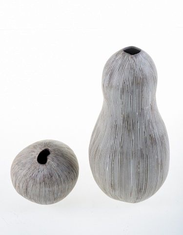 Appraisal: Gourd Form Pottery Vessels Two pottery vessels in the form