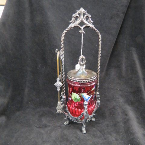 Appraisal: Victorian Enameled Cranberry Glass Pickle Castor in fancy silverplate holder