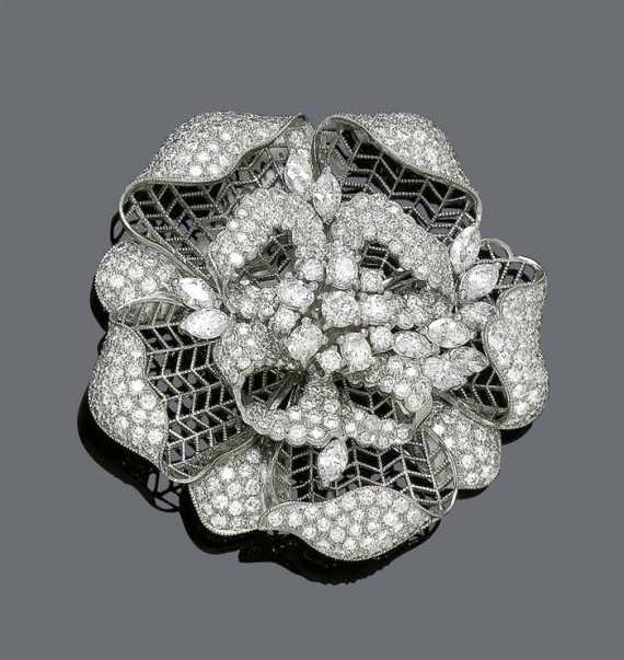 Appraisal: DIAMOND BROOCH ca White gold Enchanting finely open-worked flower brooch