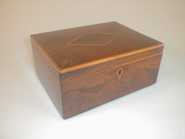 Appraisal: A Georgian rosewood rectangular parquetry work box with boxwood stringing