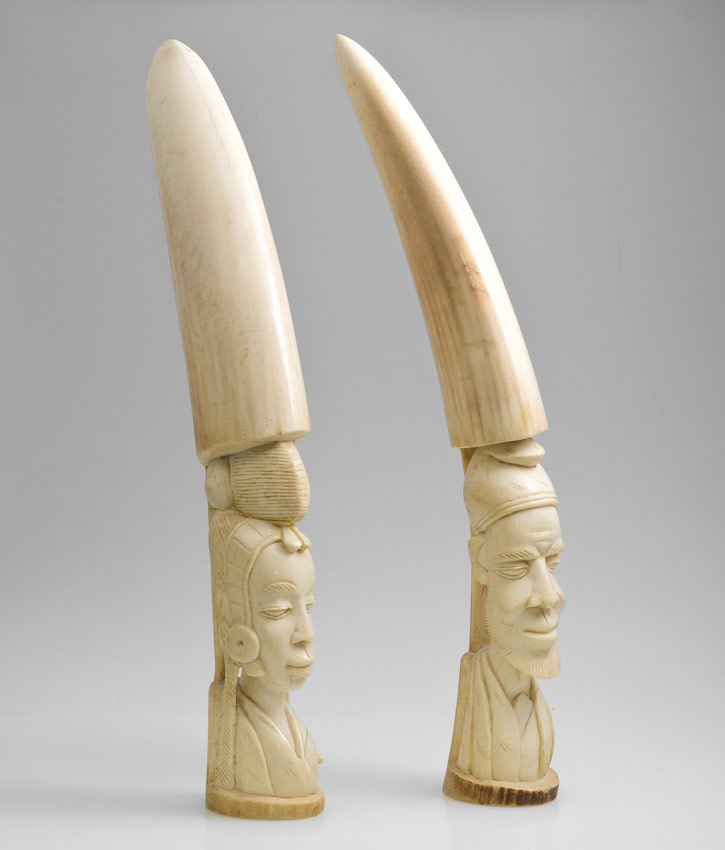 Appraisal: PAIR CARVED AFRICAN IVORY BUST TUSKS Figural busts of man