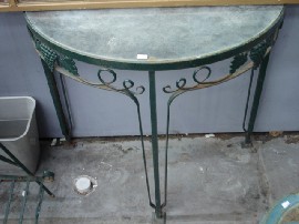 Appraisal: A painted metal plant stand together with a demi lune