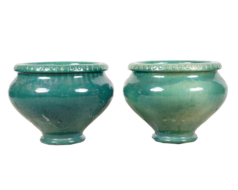 Appraisal: PAIR OF GLADDING MCBEAN GREEN-GLAZED POTTERY PLANTERSnot drilled Provenance Important