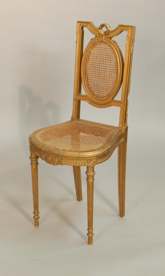 Appraisal: An early thC French side chair with a caned oval