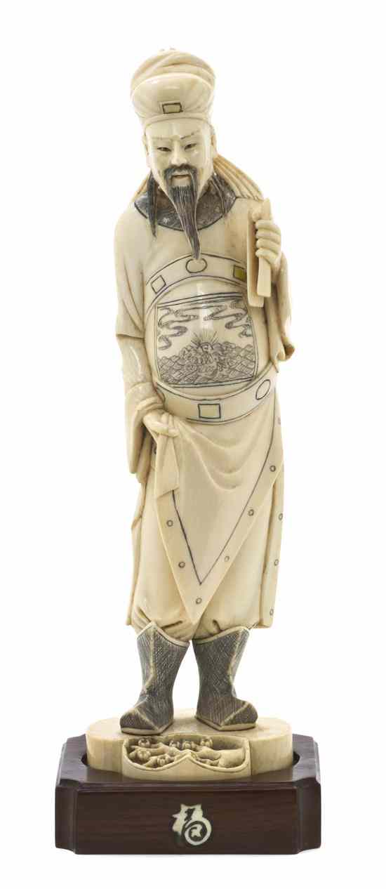 Appraisal: A Chinese Carved Ivory Figure of a General depicted standing