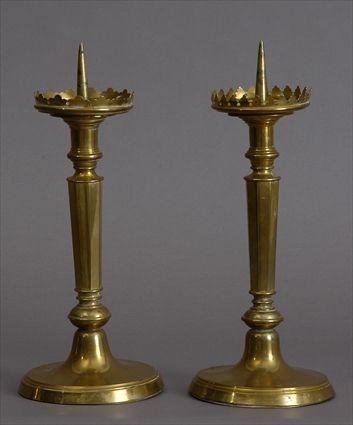 Appraisal: PAIR OF CONTINENTAL BRASS PRICKET STICKS Each octagonal tapered stem