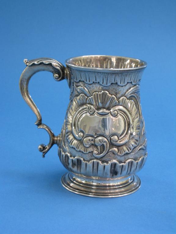 Appraisal: A George III baluster Christening Mug with floral and scroll