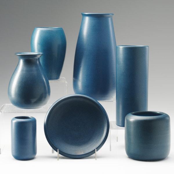 Appraisal: MARBLEHEAD Six vases and a bowl covered in indigo glaze