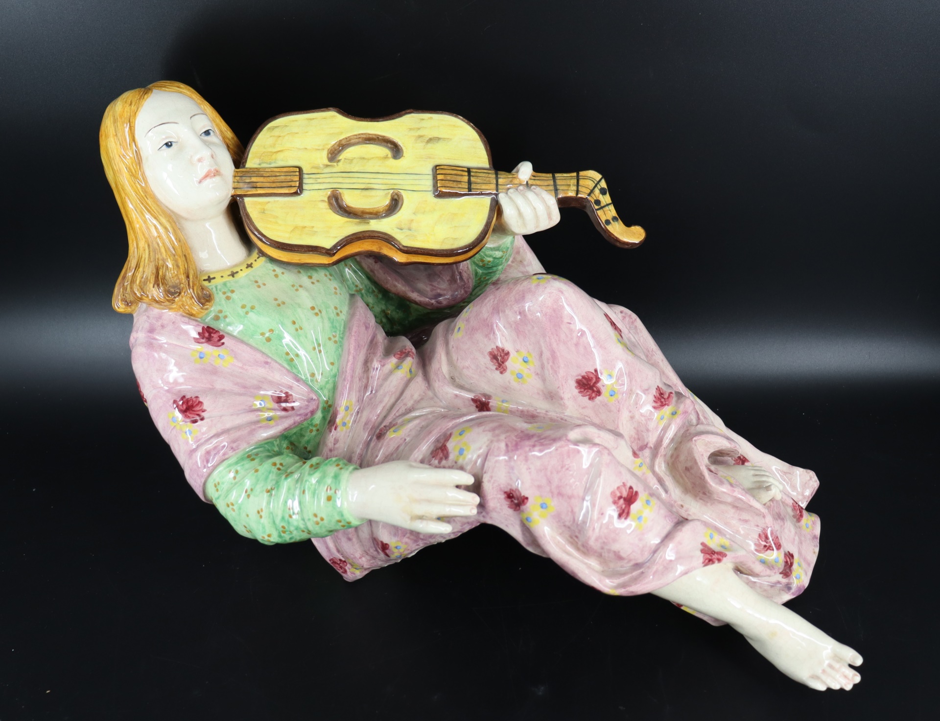 Appraisal: Large Italian Glazed Pottery Figure of a Musician Made to