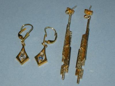 Appraisal: A PAIR OF GOLD DROP EARRINGS each set with diamond