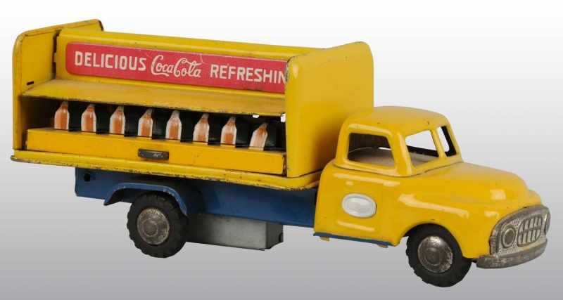 Appraisal: Tin Yellow Coca-Cola Truck Description Japanese Made by SAN Minor