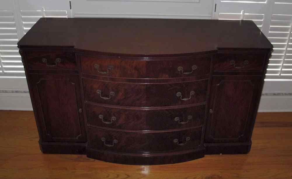 Appraisal: WHITE FURNITURE RICHLY GRAINED MAHOGANY SIDEBOARD Shaped top with center