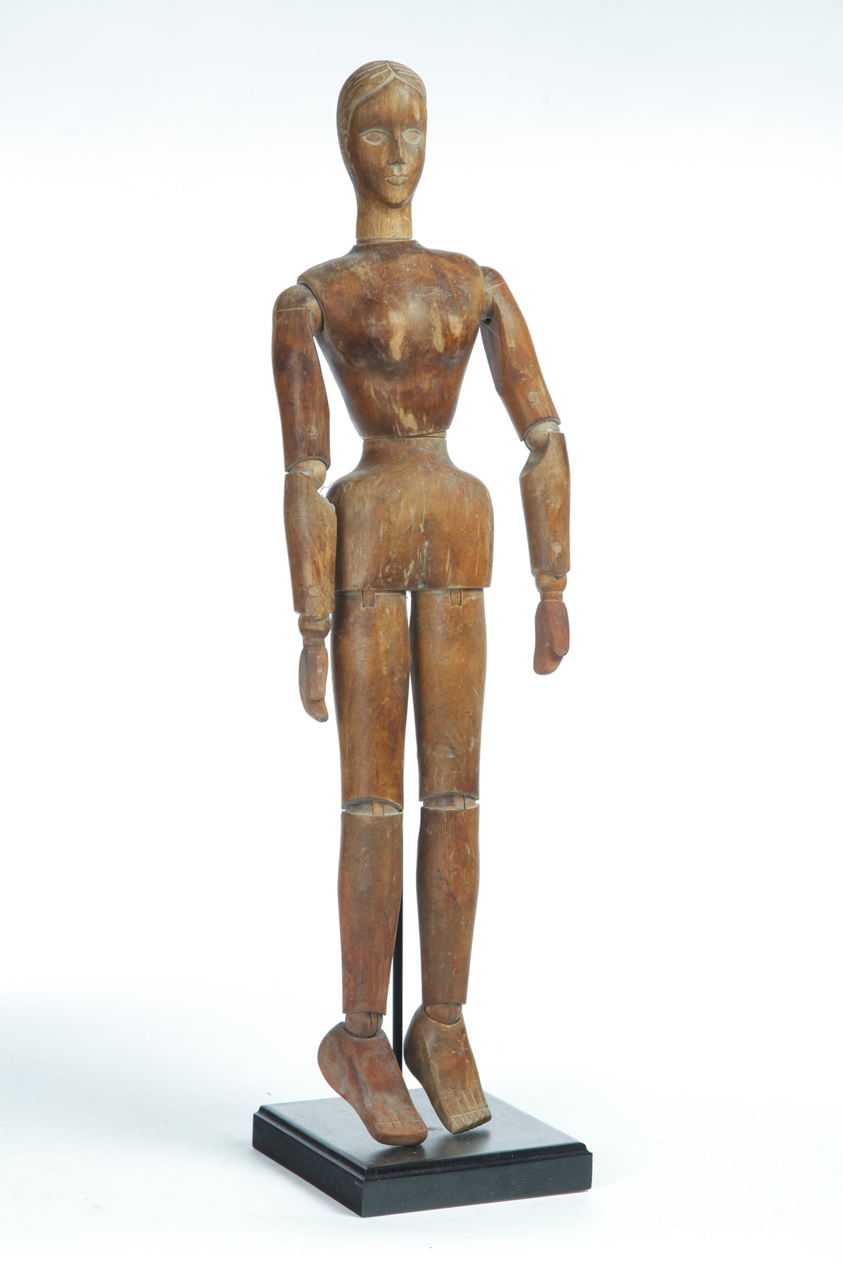 Appraisal: ARTIST MANNEQUIN Probably American early th century Carved female form