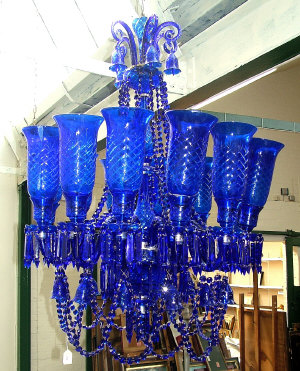 Appraisal: A Persian th century style Bristol blue twelve light crystal