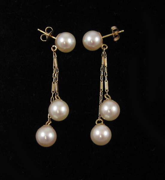 Appraisal: PAIR OF PEARL DANGLE EARRINGS each with a round white