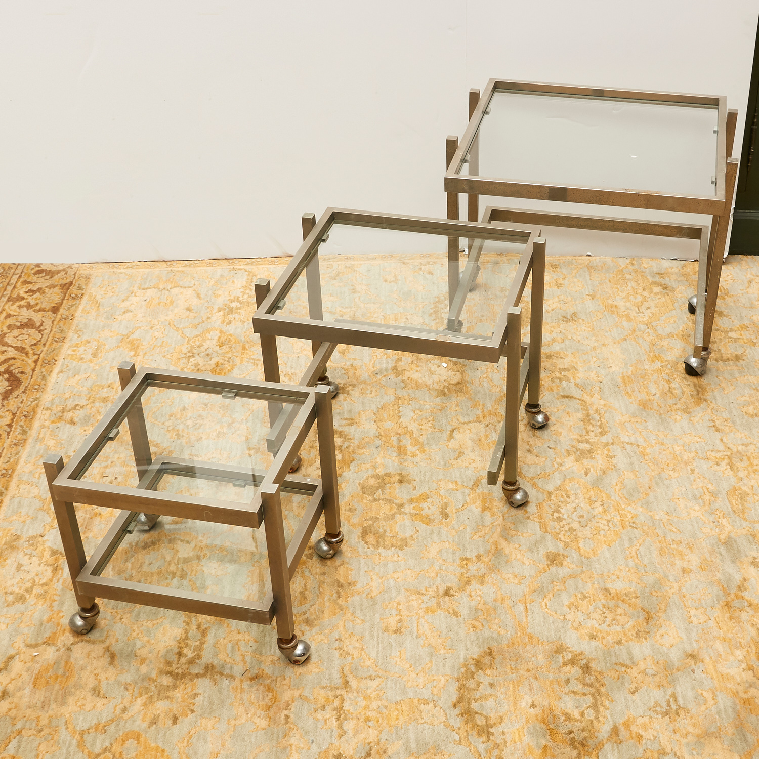 Appraisal: SET MODERNIST ALUMINUM GLASS NESTING TABLES Mid th c on