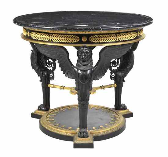 Appraisal: An Empire Style Gilt and Patinated Bronze Center Table with