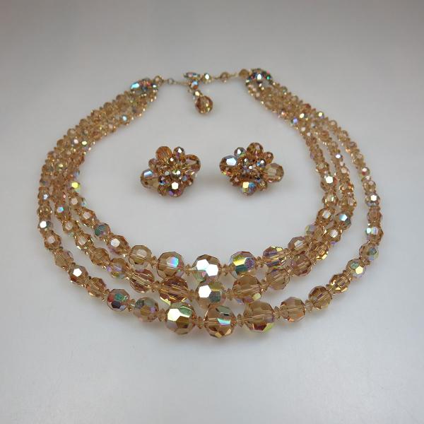 Appraisal: Sherman Triple Strand Golden Rhinestone Necklace And Clip Earrings cm