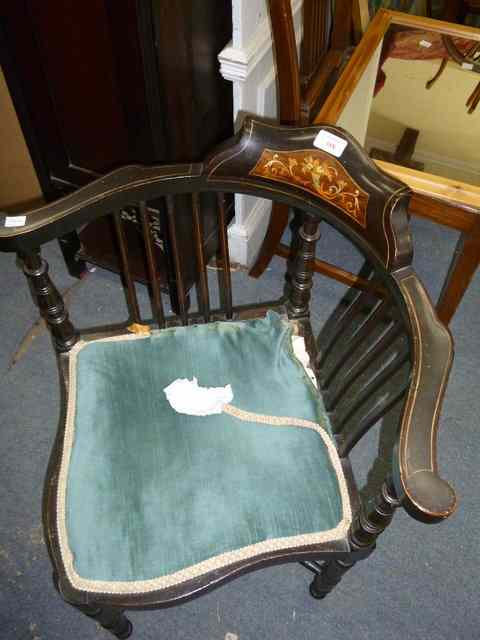 Appraisal: A PAIR OF EDWARDIAN EBONISED CORNER CHAIRS with inlaid stringing