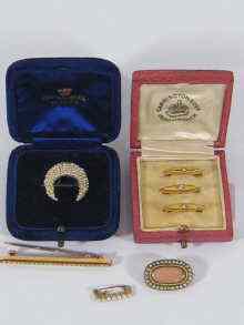 Appraisal: A mixed lot comprising three pearl set ct gold ''baby''