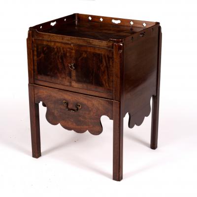 Appraisal: A George III mahogany tray top commode with cupboard doors