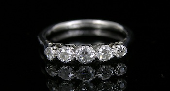 Appraisal: A Vintage Platinum and Diamond Band Platinum band set to